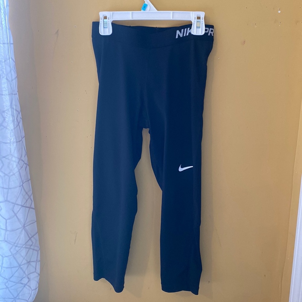 Fits like XS-S Nike leggings. Short Ankle length